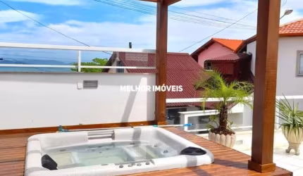 Casa á 10 metros da praia com Terraço vista Mar, Equipada com 04 dormitórios sendo 01 suíte máster à Venda em Governador Celso Ramos - SC