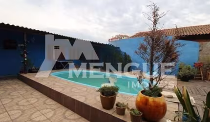 Casa com 4 quartos à venda na Rua Ararás, 492, Sarandi, Porto Alegre por R$ 600.000