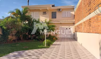 Casa em condomínio fechado com 4 quartos à venda na Rua Tapirapés, 184, Sarandi, Porto Alegre por R$ 999.000