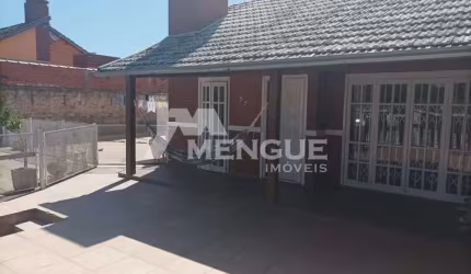 Casa com 3 quartos à venda na Condoris, 57, Jardim Algarve, Alvorada por R$ 560.000