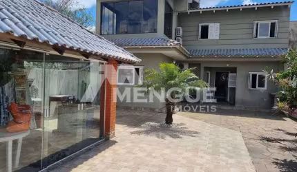 Casa com 3 quartos à venda na Rua Coronel João Pacheco de Freitas, 404, Jardim Itu Sabará, Porto Alegre por R$ 700.000