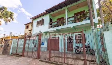Casa com 3 quartos à venda na Rua Guadalajara, 115, Jardim Itu Sabará, Porto Alegre por R$ 750.000