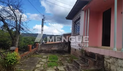 Casa com 2 quartos à venda na Beco Circular, 883, Jardim Itu Sabará, Porto Alegre por R$ 480.000