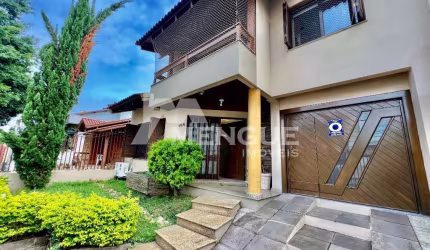 Casa com 4 quartos à venda na Rua Juruá, 105, Cristo Redentor, Porto Alegre por R$ 1.290.000