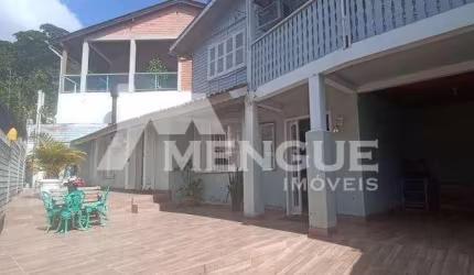 Casa com 3 quartos à venda na Rua Doutor Ernesto Miranda, 195, Jardim São Pedro, Porto Alegre por R$ 420.000