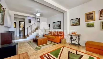 Casa com 4 quartos à venda na Rua Augusto Attílio Giordani, 159, São Sebastião, Porto Alegre por R$ 699.000