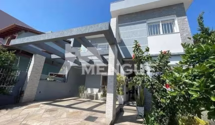 Casa com 3 quartos à venda na Rua Théo Benevenuto, 195, Ecoville, Porto Alegre por R$ 980.000