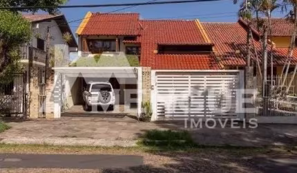 Casa com 4 quartos à venda na Rua Doutor Paulino Guerra, 575, Jardim Itu Sabará, Porto Alegre por R$ 1.298.000