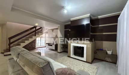 Casa com 3 quartos à venda na Rua Rudi Schaly, 315, Parque Santa Fé, Porto Alegre por R$ 740.000