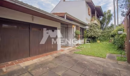 Casa com 4 quartos à venda na Rua Araponga, 233, Chácara das Pedras, Porto Alegre por R$ 990.000