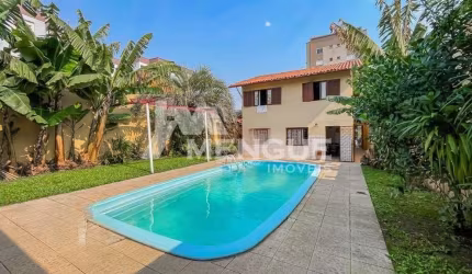 Casa com 4 quartos à venda na Rua Fernando Cortez, 476, Cristo Redentor, Porto Alegre por R$ 1.170.000