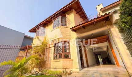 Casa com 3 quartos à venda na Rua Walir Zottis, 540, Jardim Planalto, Porto Alegre por R$ 750.000