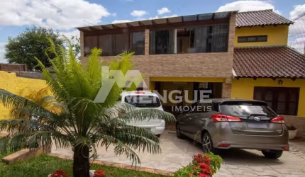 Casa com 3 quartos à venda na Rua Coronel José Rodrigues Sobral, 584, Partenon, Porto Alegre por R$ 2.100.000