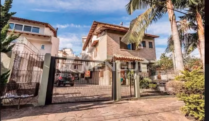 Casa em condomínio fechado com 3 quartos à venda na Avenida Karl Iwers, 252, Jardim Itu Sabará, Porto Alegre por R$ 638.300