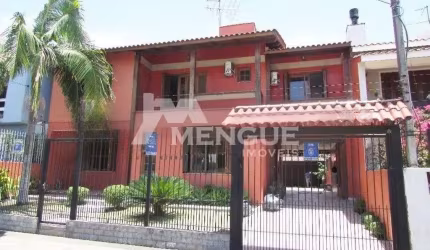 Casa com 4 quartos à venda na Rua Dom Jaime de Barros Câmara, 276, Sarandi, Porto Alegre por R$ 980.000