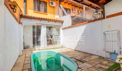 Casa com 2 quartos à venda na Rua Manoel Bandeira, 426, Jardim Itu Sabará, Porto Alegre por R$ 480.000
