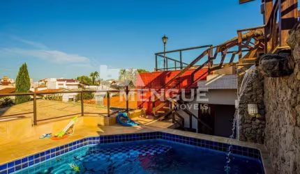 Casa com 4 quartos à venda na Rua Doutor Derly Monteiro, 0395, Jardim Planalto, Porto Alegre por R$ 1.080.000