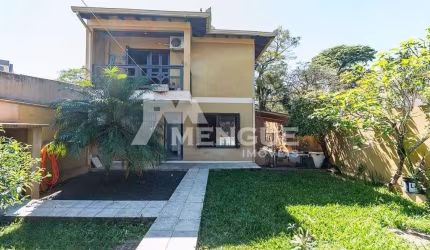 Casa com 3 quartos à venda na Rua Eugênio Du Pasquier, 283, Cristo Redentor, Porto Alegre por R$ 890.000