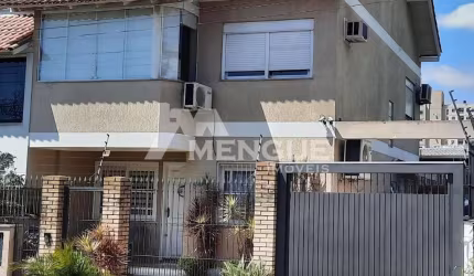 Casa com 3 quartos à venda na Rua Hugo Nelson Magalhães, 542, Parque Santa Fé, Porto Alegre por R$ 560.000