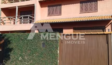 Casa com 7 quartos à venda na Rua Tuparaí, 21, Passo da Areia, Porto Alegre por R$ 1.450.000
