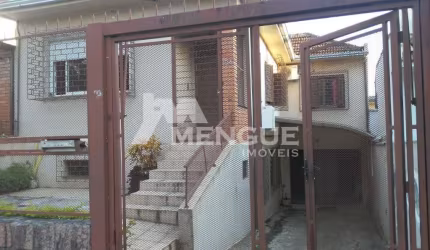 Casa com 3 quartos à venda na Rua Augusto Attílio Giordani, 174, São Sebastião, Porto Alegre por R$ 650.000