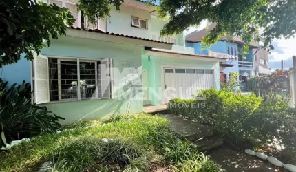Casa com 3 quartos à venda na Rua Vitório Francisco Giordani, 210, Jardim Itu Sabará, Porto Alegre por R$ 980.000