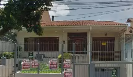 Casa com 5 quartos à venda na Avenida Brasília, 292, Vila Ipiranga, Porto Alegre por R$ 1.170.000