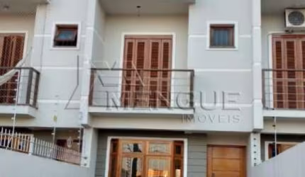 Casa com 3 quartos à venda na Rua Hugo Nelson Magalhães, 139, Parque Santa Fé, Porto Alegre por R$ 520.000