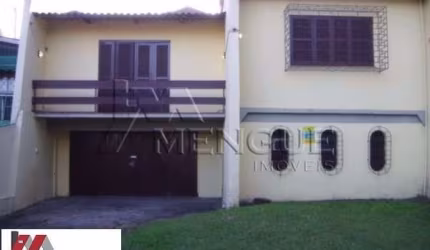 Casa com 3 quartos à venda na Rua Guadalajara, 205, Jardim Itu Sabará, Porto Alegre por R$ 500.000