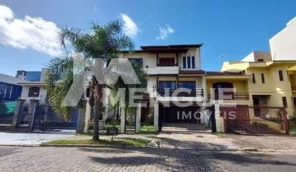 Casa com 4 quartos à venda na Rua Maestro Salvador Campanella, 116, Jardim Itu Sabará, Porto Alegre por R$ 1.900.000