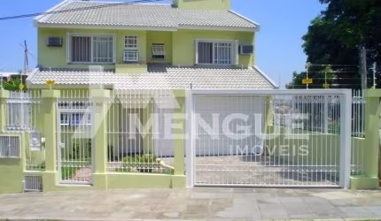 Casa com 3 quartos à venda na Rua Pedro A. A. de Freitas Filho, 310, Jardim Itu Sabará, Porto Alegre por R$ 1.199.000