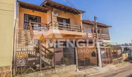 Casa com 5 quartos à venda na Rua Waldomiro Silveira Dias, 40, Jardim Itu Sabará, Porto Alegre por R$ 449.000
