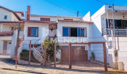 Casa com 4 quartos à venda na Rua General Sady Cahen Fischer, 55, Parque Santa Fé, Porto Alegre por R$ 1.400.000
