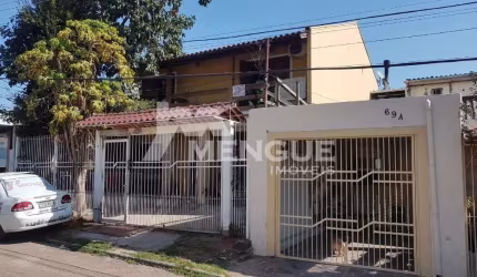 Casa com 3 quartos à venda na Rua Professor Frederico Lamachia Filho, 695, Costa e Silva, Porto Alegre por R$ 600.000