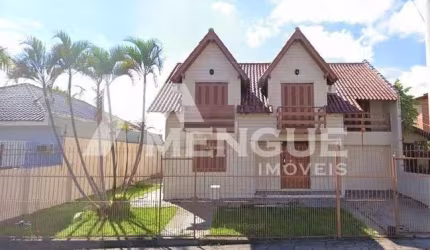 Casa com 3 quartos à venda na Rua Zeferino Dias, 823, Sarandi, Porto Alegre por R$ 680.000
