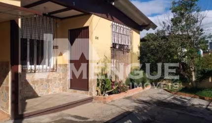 Casa com 3 quartos à venda na Rua Hermeto Bermudez, 95, Jardim Leopoldina, Porto Alegre por R$ 519.000