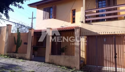 Casa com 3 quartos à venda na Rua Monte Flor, 68, Jardim Floresta, Porto Alegre por R$ 590.000