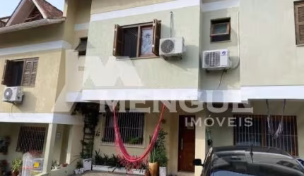 Casa em condomínio fechado com 3 quartos à venda na Rua Monte Flor, 276, Jardim Floresta, Porto Alegre por R$ 599.000