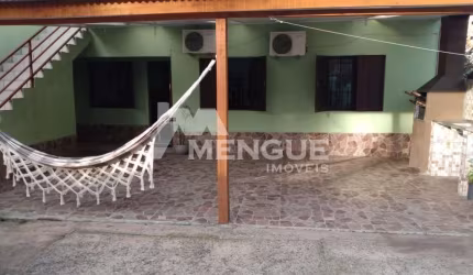 Casa em condomínio fechado com 3 quartos à venda na Rua Irene Capponi Santiago, 329, Cristo Redentor, Porto Alegre por R$ 265.000