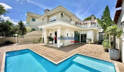 Casa com 4 dormitórios, 358 m² - venda por R$ 2.800.000,00 ou aluguel por R$ 17.999,35/mês - Golf Park - Carapicuíba/SP