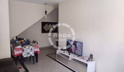 Casa Sobreposta baixa a venda de 3 dormitórios, 1 suíte, em Santos no bairro Aparecida