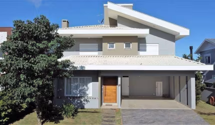 Casa à venda em condomínio horizontal, com 4 suítes, piscina e espaço gourmet, Campeche, Florianópo