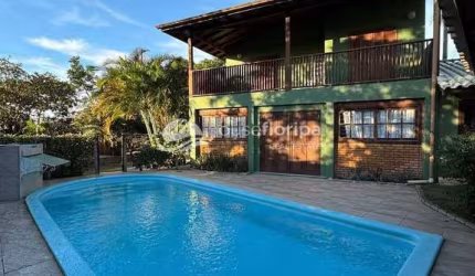 Casa com 4 quartos, churrasqueira, espaço gourmet  e piscina perto da praia Campeche à venda, Rio T