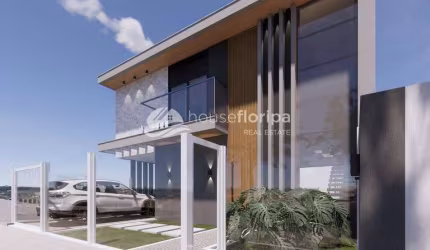Encantadora casa de 3 quartos, 1 suíte, com vista para o mar e churrasqueira à venda no bairro João