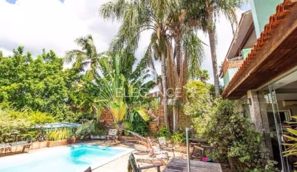 Elegance imóveis vende casa, 380m, 3 dormitórios, 3 suítes, closet, living de 4 ambientes, piscina e 4 vagas de garagem/box. Comprar R$ 1.890.000,00.