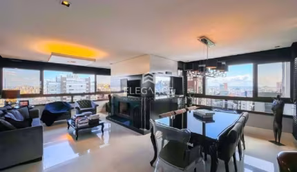 Elegance Imóveis vende apartamento mobiliado em andar alto com 3 dormitórios e 3 suítes 3 vagas box garagem Rio Branco Porto Alegre.