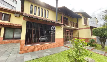 Elegance Imóveis vende casa / sobrado desocupada com 4 dormitórios suíte 7 vagas box/garagem. Vila Ipiranga Porto Alegre