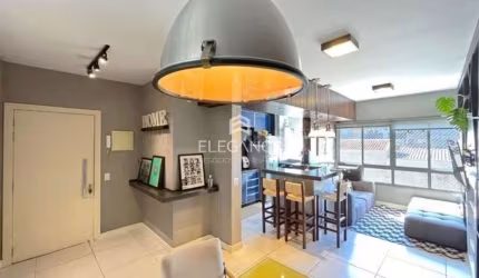 Elegance imóveis vende lindo apartamento mobiliado e decorado por arquiteto de 2 dormitórios, 1 suíte, closet e 1 vaga de garagem/box em Menino Deus - Porto Alegre