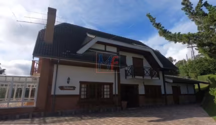 Excelente casa em cond. fechado em Campos do Jordão - SP, 400 m² a.c., 4 quartos (4 suítes), sala, lareira, cozinha, escritório (REF 18.395)