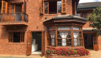REF 16.282 Linda casa em  condomínio fechado  , 568 m²  a.u. , Mairiporã ,4 suítes, sala 3 ambientes, lareira, piscina, área gourmet e 3 vagas.